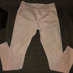 Light pink ripped jeans